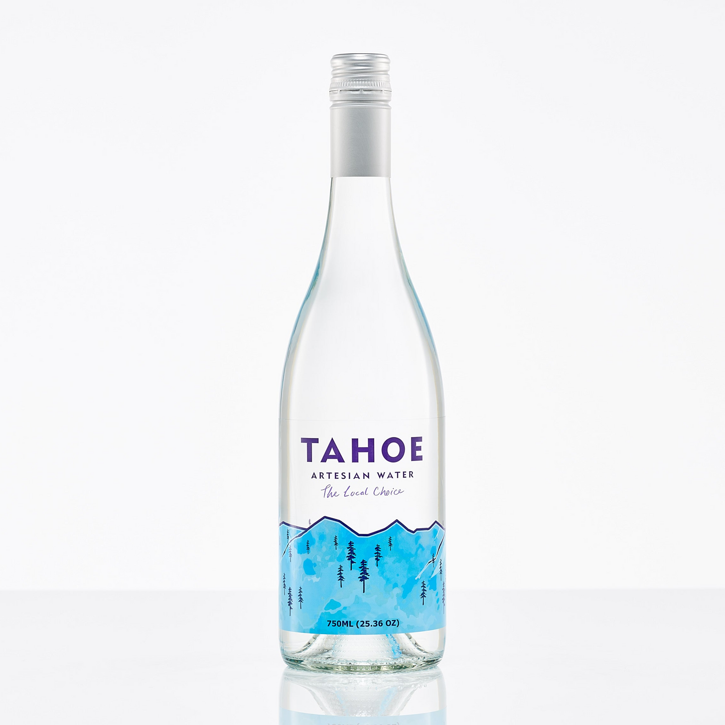A clear glass bottle of Tahoe Artesian Water with a label showing the brand name and a blue graphic representing Tahoe National Forest.